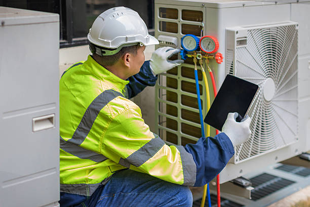 Professional Ductwork Repair technician working in The Rock, GA
